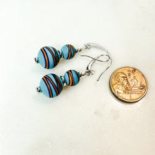 Swirl beads double drop earrings
