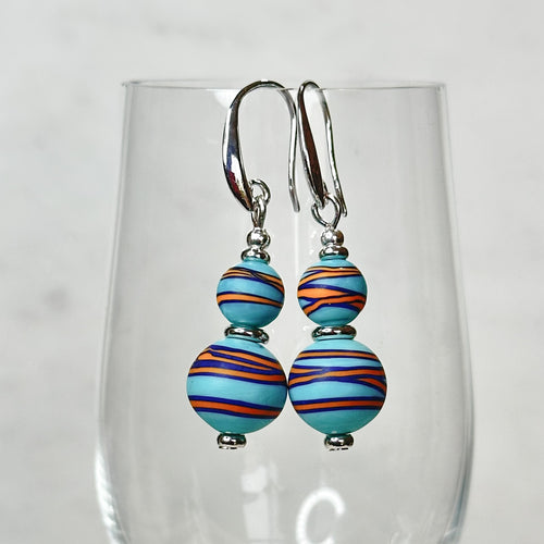 Swirl beads double drop earrings